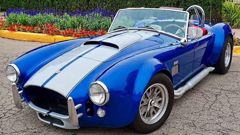 ジグソーパズルのヒント:青いオープンカー